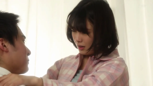 Indoor · Medium shot · 对坐 · Stroking the shoulder · 忧伤 · 成年男女 · 粉色格纹衬衫