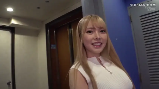 Stand · Smile · Facing the camera · Half-body · Corridor · Blonde · White sleeveless knit top