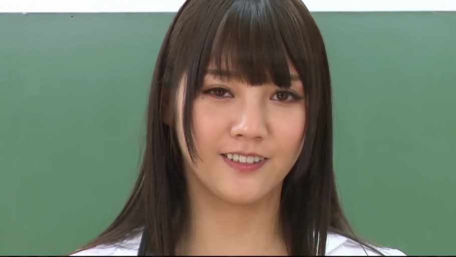 Classroom · Close-up of the face · 白衬衫 · 注视镜头 · 正面 · 长发齐刘海 · 露齿微笑