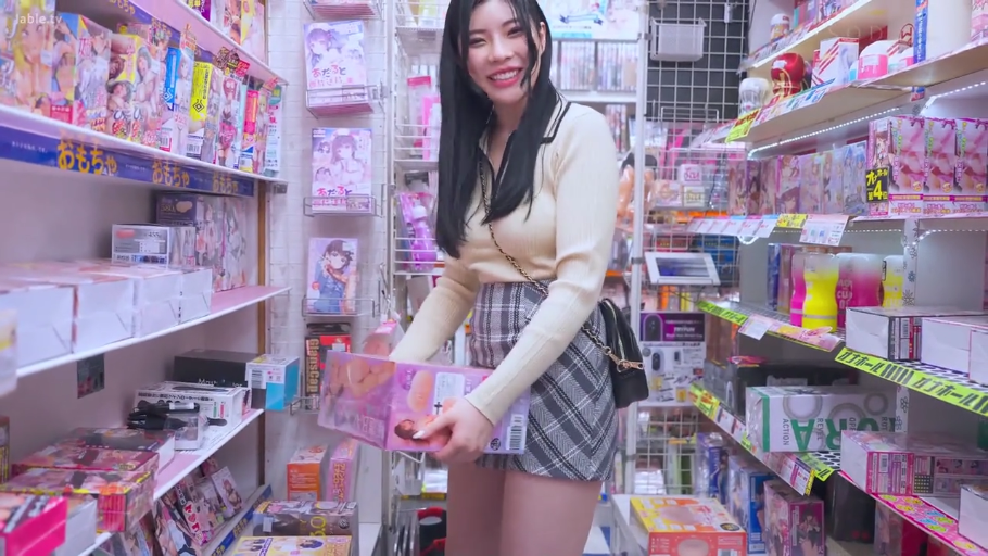 Medium shot · Standing Posture · 格纹短裙 · Smile · 长发 · 购物 · 情趣用品店 · 成人玩具包装